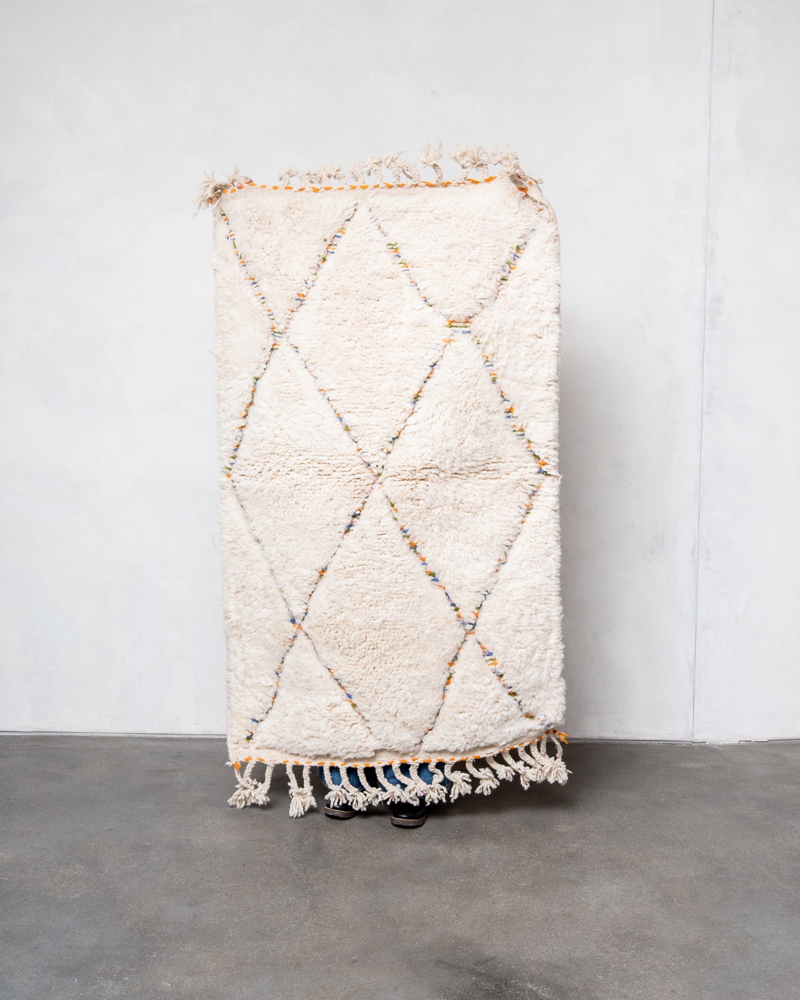 Modern, designer, handcrafted Berber rug from Morocco. Beniourain carpet with beautiful colours and patterns and fluffy wool texture.